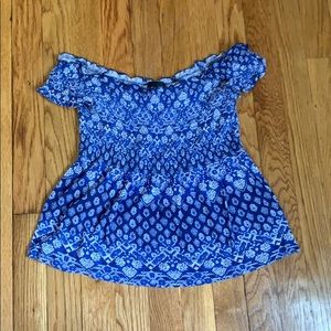 Blue off-the-shoulder shirt